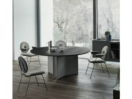 Tavolo rotondo Magnum con base in cemento e piano in legno impiallaciato di Bontempi