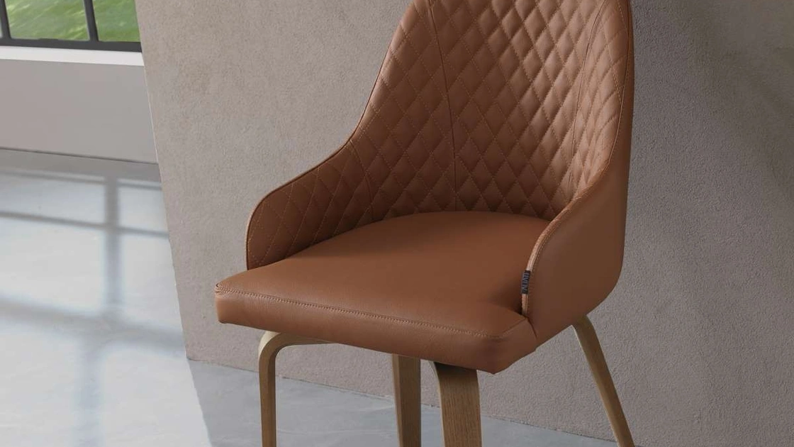 Sedia Atena in pelle con gambe in legno di Ozzio